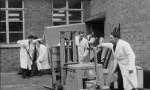 Frame from film 3833 - INSTALLING OF A NATIONAL 405 COMPUTER AT DANSOM LANE (1959)